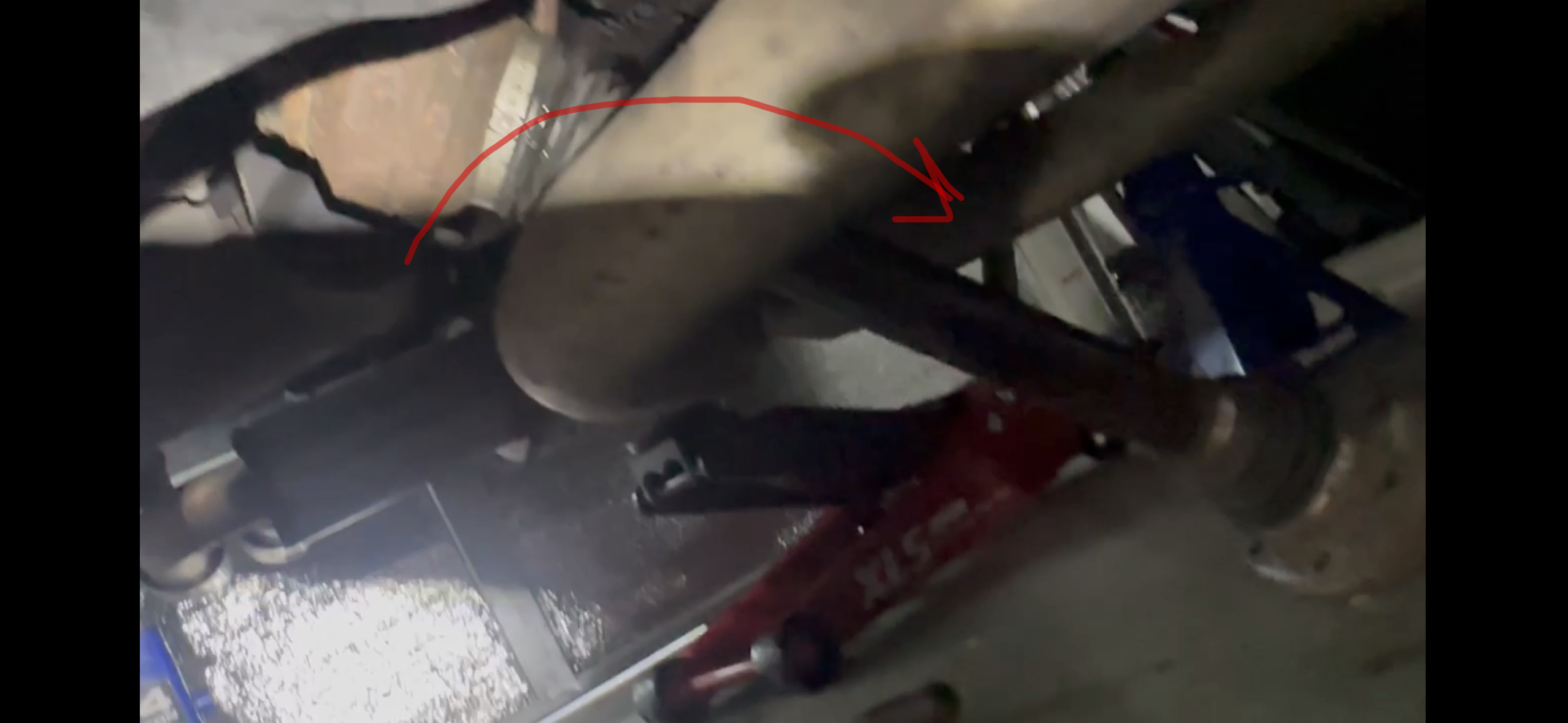 Rear muffler lowered for clearance